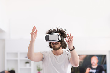 Image showing man using VR-headset glasses of virtual reality