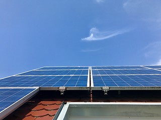 Image showing House roof with solar panels on top
