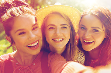 Image showing happy women or friends taking selfie at summer