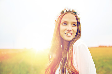 Image showing smiling young hippie woman on cereal field