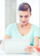 Image showing smiling student girl with tablet pc