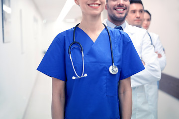 Image showing close up of medics or doctors at hospital corridor