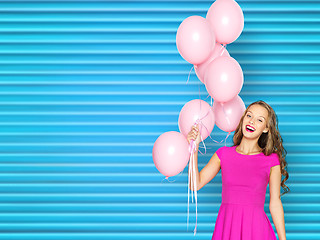 Image showing happy young woman or teen girl in pink dress