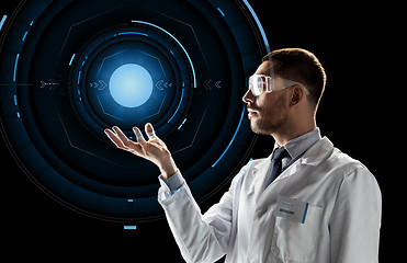 Image showing scientist in lab goggles with virtual projection