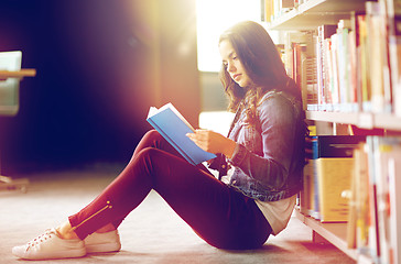 Image showing high school student girl reading book at library