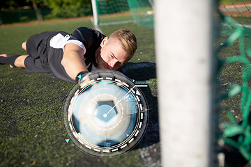 Image showing goalkeeper with ball at football goal on field