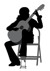 Image showing Young woman playing acoustic guitar