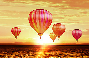 Image showing air balloons on sunset