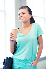 Image showing student holding take away coffee cup