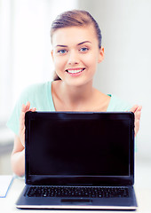 Image showing smiling student girl with laptop