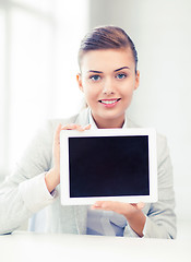 Image showing businesswoman with tablet pc in office