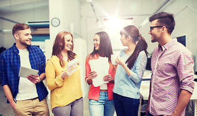 Image showing creative team on coffee break talking at office