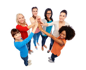 Image showing international group of happy women doing high five