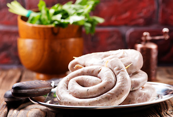 Image showing raw sausages