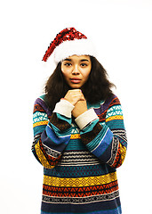 Image showing cute young girl in santas red hat isolated