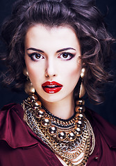 Image showing beauty rich brunette woman with a lot of jewellery