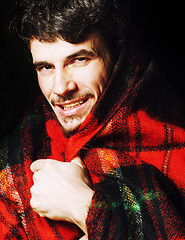 Image showing portrait of handsome man warmed up in scarf christmas colored