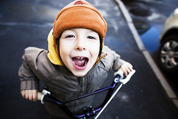 Image showing little cute boy in hammock smiling