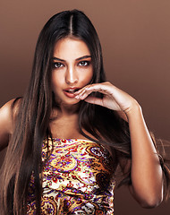 Image showing cute happy young indian woman in studio close up smiling, fashion mulatto