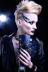 Image showing Fashion Rocker Style Model Girl Portrait. Hairstyle. Punk Woman Makeup, Hairdo and black Nails. Smoky Eyes