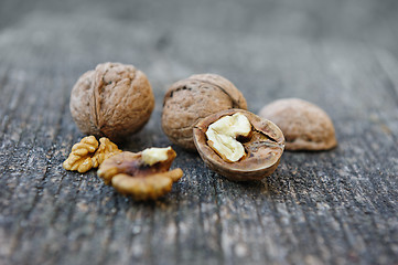 Image showing Walnuts at old wooden plank