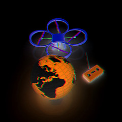 Image showing Quadrocopter Drone with Earth Globe and remote controller on a w