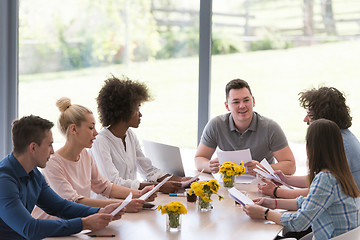 Image showing Multiethnic startup business team on meeting