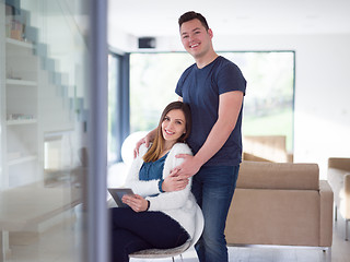 Image showing couple using tablet at home