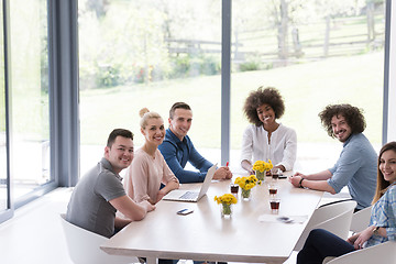 Image showing Multiethnic startup business team on meeting