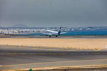 Image showing ARECIFE, SPAIN - APRIL, 16 2017: AirBus A321 of ThomasCook.com w