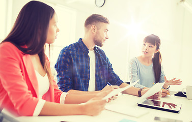 Image showing happy creative team or students working at office