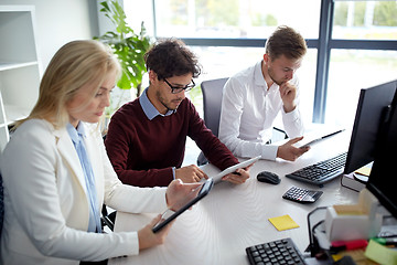 Image showing business team with tablet pc at office