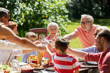 Image showing happy family having dinner or summer garden party