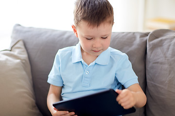Image showing little boy with tablet pc computer at home