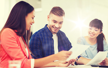 Image showing happy creative team or students working at office