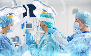 Image showing surgeons in operating room at hospital