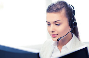 Image showing friendly female helpline operator