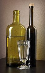 Image showing  Shot Glass and Two Bottles