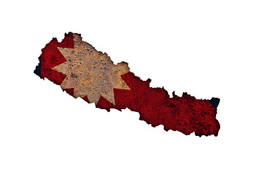 Image showing Map and flag of Nepal on rusty metal