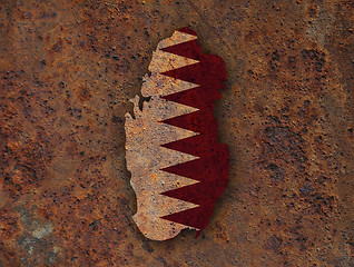 Image showing Map and flag of Qatar on rusty metal