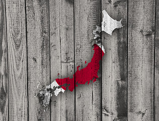 Image showing Map and flag of Japan on weathered wood