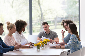 Image showing Multiethnic startup business team on meeting