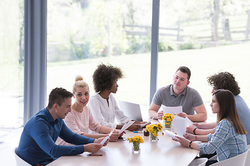 Image showing Multiethnic startup business team on meeting