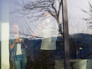 Image showing young couple enjoying morning coffee