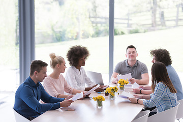 Image showing Multiethnic startup business team on meeting