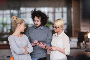 Image showing group of Business People Working With Tablet in startup office