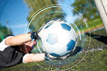 Image showing goalkeeper with ball at football goal on field