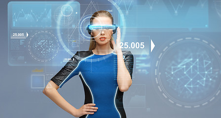 Image showing woman in virtual reality 3d glasses with charts