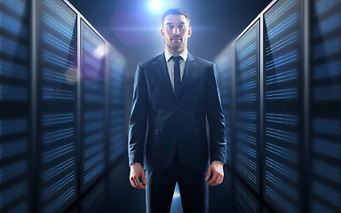 Image showing businessman over server room background