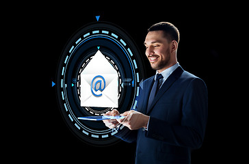 Image showing businessman with tablet pc and e-mail hologram